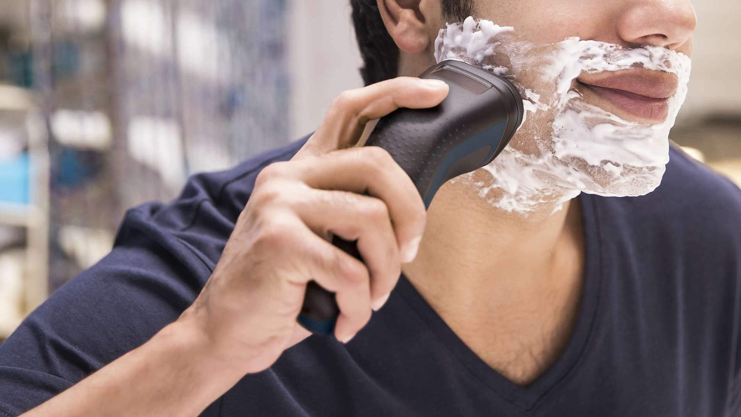 PHILIPS 1100 Wet or Dry Electric Shaver (Black/Blue, S1121/41)