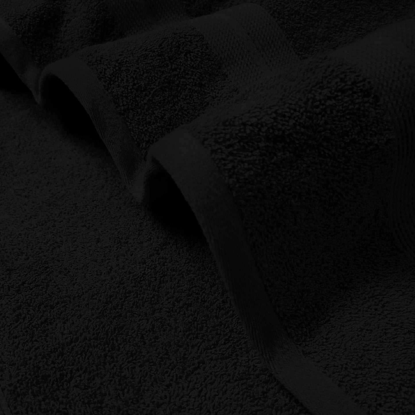 a close up of a umbrella on a dark surface