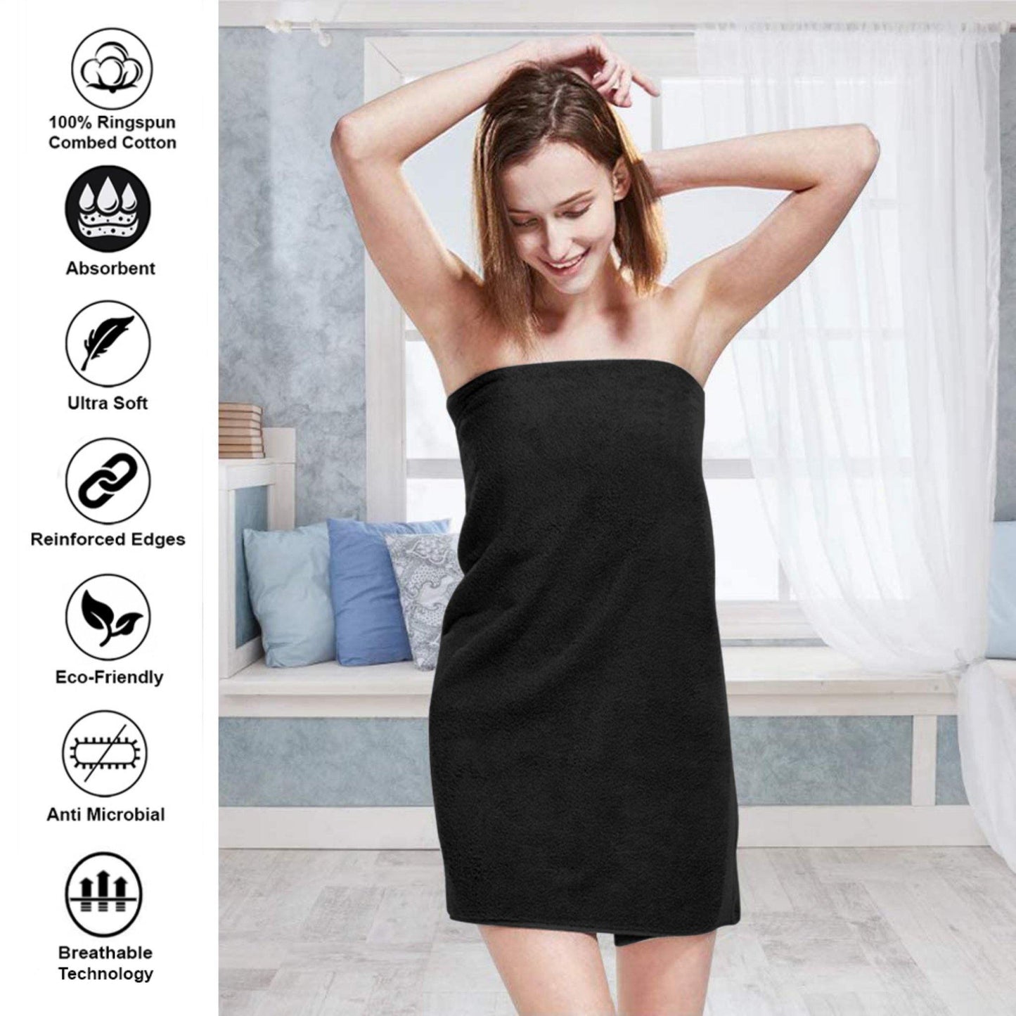 a woman in a black dress standing in a bathroom