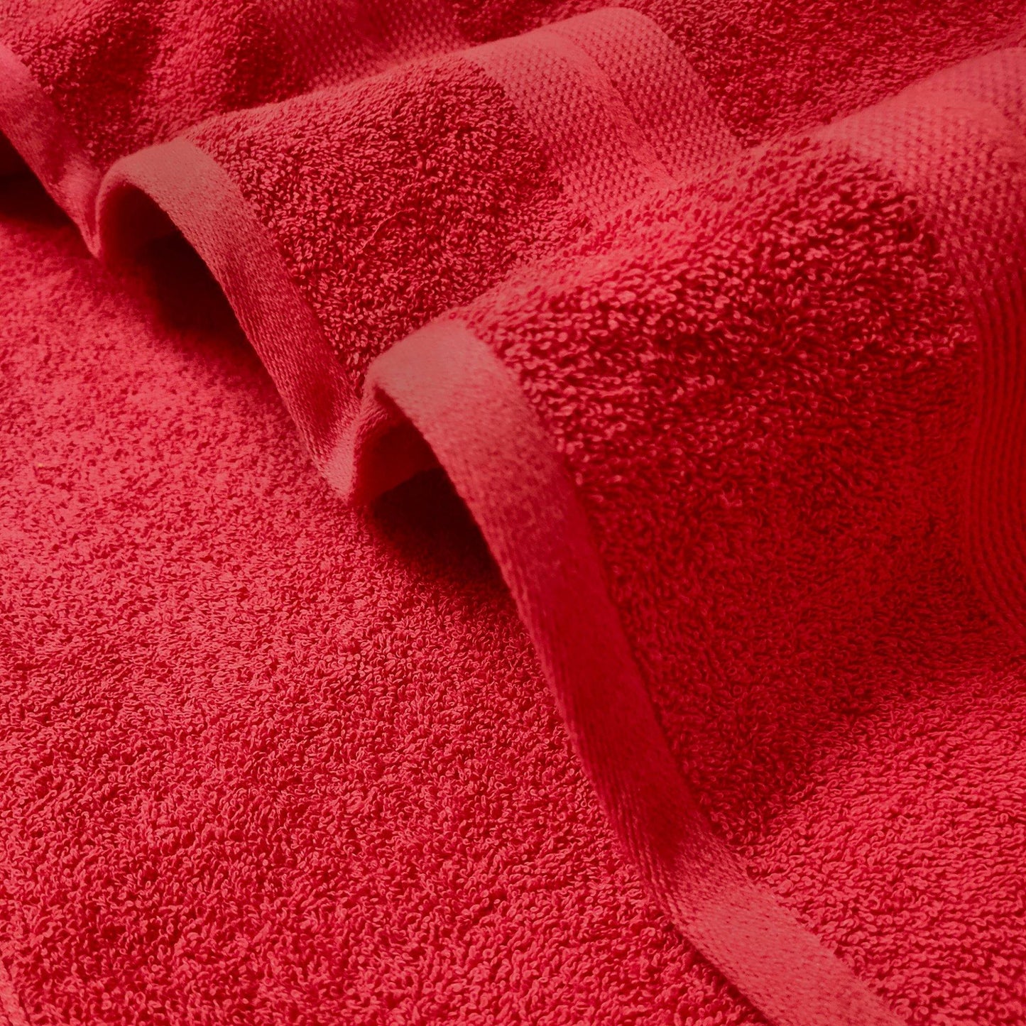 a close up of a red tie on a red shirt